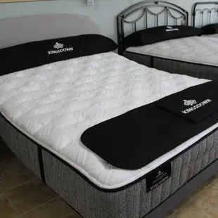 Mattresses and adjustable bases. Kingsdown, Therapedic, and Symbol made in the USA.