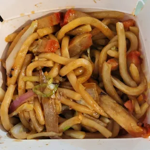 BBQ Pork lo mein in the carry out box.