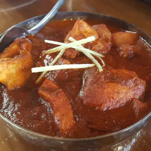 Chicken Vindaloo w/ potatoes - very spicy!!! I would get the tikka next time.