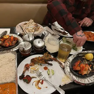 a table full of food and drinks