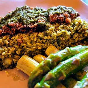 a plate of food with broccoli and asparagus