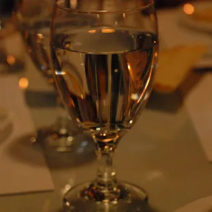 2016:  Your water glass is never empty or so it seems. You have to be fast (or cover your glass) if don't want your water refilled.