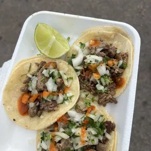 a person holding a plate of food