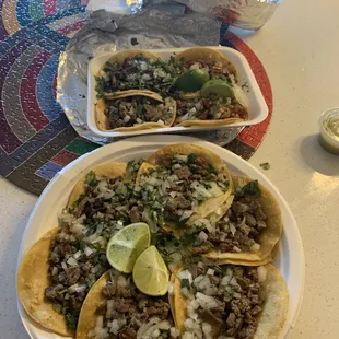 Carne asada and pastor tacos.