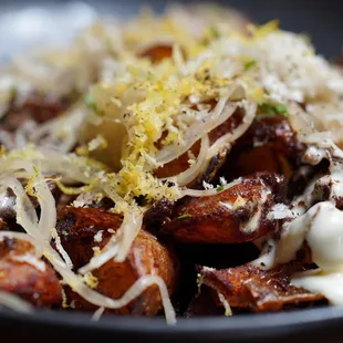 Butterball Potatoes, Crème Fraiche, Pickled Onion, Shishito, Horseradish