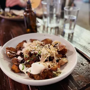 Food |  Butterball Potatoes, Crème Fraiche, Pickled Onion, Shishito, Horseradish