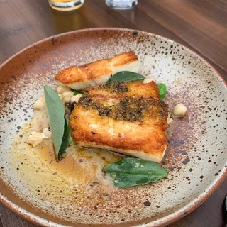 Halibut, Fava, Hominy, St. Felicien Butter, Cilantro, Tendrils