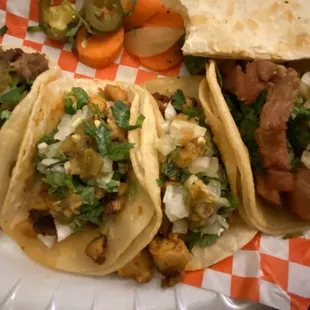 Carne Asada, chicken and carnitas tacos