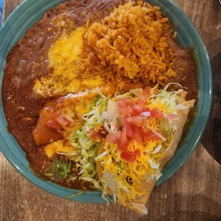 Cheese enchilada lunch menu with sides beans and rice with a Beef Toco (extra charge)