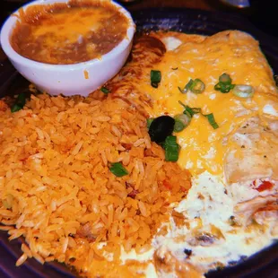 Tres amigos enchiladas, chicken, spinach, and beef