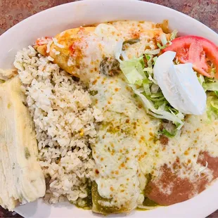 3 item combo Chicken Enchilada with salsa verde, sweet corn tamale and Chile Relleno with beans and rice.