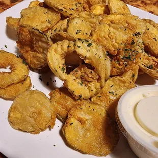 Love their fried pickles. I add them to my po boy or burger