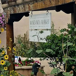 a sign in a garden