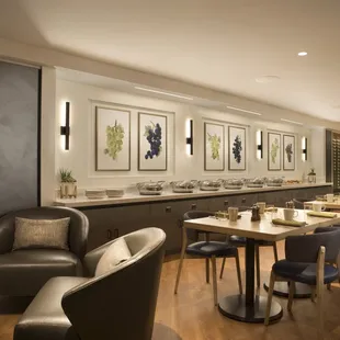 a dining room with tables and chairs