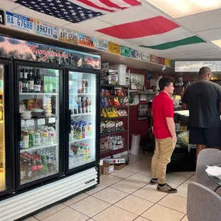 Small counter but they have tables outside as well. Here are some their drink choices in front of the counter.