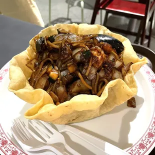 a plate of food with a fork and knife