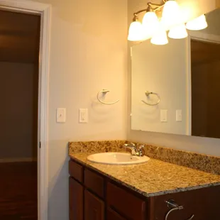 Our bathrooms feature beautiful granite counter tops.