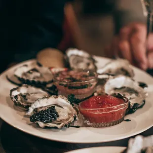 Raw Oysters on the Half Shell. Oyster Happy Hour every Monday - Wednesday.