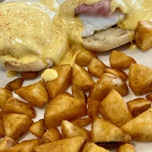 Classic Eggs Benedict with breakfast potatoes