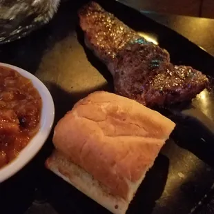 Garlic toast bbq baked beans, strip steak and baked potato sour cream and  butter