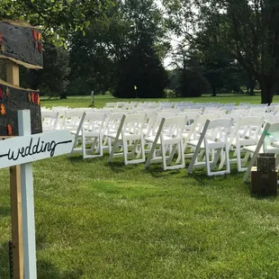 Wedding ceremony out on the golf course.