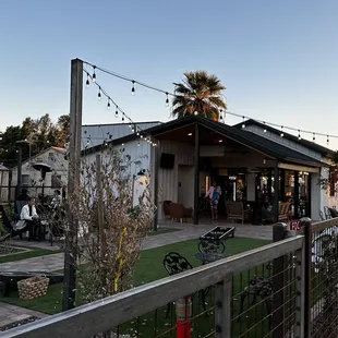 Back patio with fire pits, games and heaters