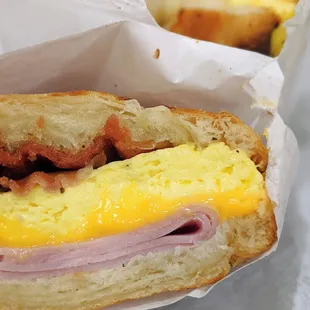 Breakfast croissant: bacon, ham, egg, cheese