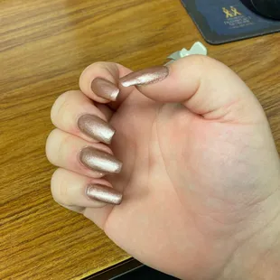 Fingers are swollen and cut.