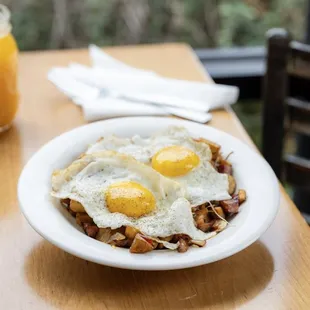 Potatoes O&apos;Ryan Bowl - homestyle potatoes, peppers, onions &amp; ham, topped with eggs your way.