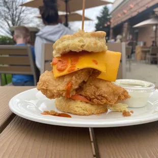 a fried chicken sandwich on a biscuit