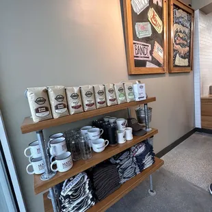 shelves of coffee and coffee cups