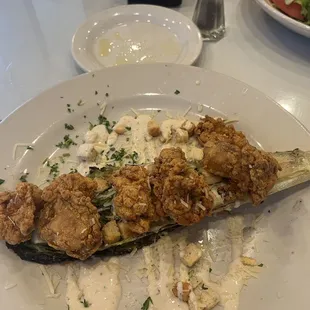 Fried oysters on grilled romaine