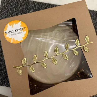 Nice touch with the gold leaf garland on the box!