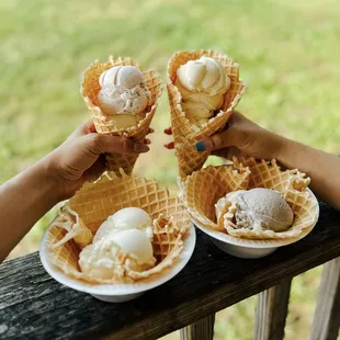 Strawberry and vanilla ice cream in waffle cones and waffle bowls IG: michellelieats