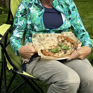 Almost too much pizza for one woman to eat in one sitting