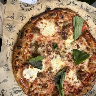 Margherita Pizza with Fennel Sausage.  The honey drizzle is amazing