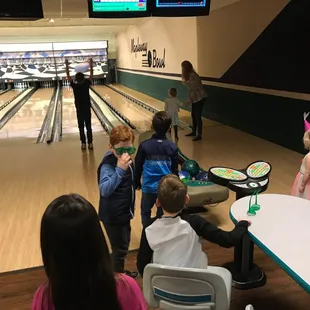 children playing bowling