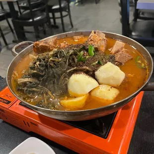 a large bowl of food on a table