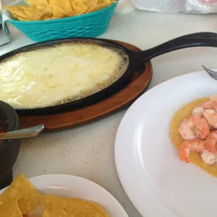 Queso Fundido-mix it w the salsa - eat w chips insted of tortillas-que Rico