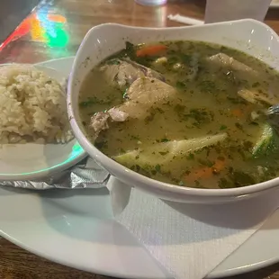 a bowl of soup and rice