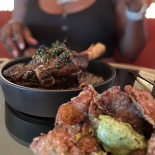 Crispy potatoes and lamb shank