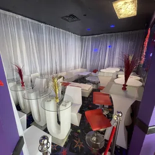 tables and chairs in a room