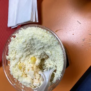 a bowl of rice and a spoon