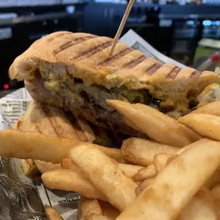 Not photogenic, but this Cuban sandwich sure was tasty (and spicy!). The fries were good too!
