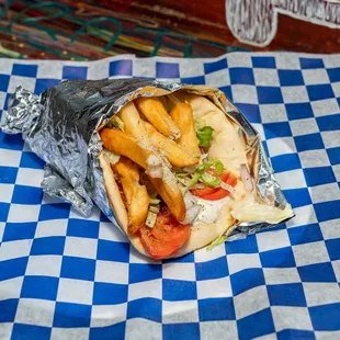 Veggie Gyro -- for those light vegetable full bites!
Vegetarian ; can be made vegan (sauces)