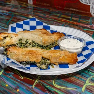 Spanakopita: phyllo-crust pie with spinach, feta cheese-mix, and herbs!
vegetarian