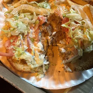 The 1 bite of steak at the bottom the rest is lettuce and tomato