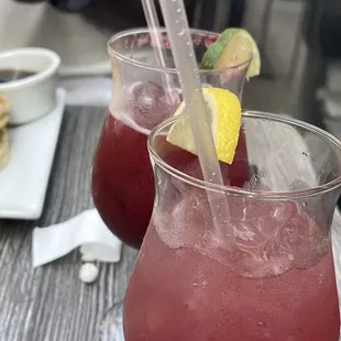 Blackberry margarita (in the back) Raspberry cocktail (front. I forgot the full name but it was delish!)