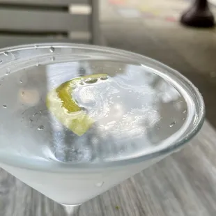 Sapphire martini ($18) in and out, stirred, up, twist. The lemon oil floats. #ftw