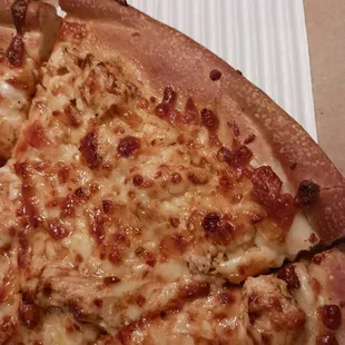 Hard and burnt Buffalo chicken pizza!